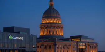 Alberta legislative building at dusk representing iGaming regulation and commercial gambling oversight