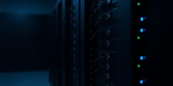 Modern server room with illuminated racks representing secure API infrastructure for gambling compliance