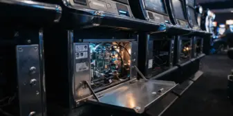 Gaming machine technical components and compliance hardware in UK betting environment
