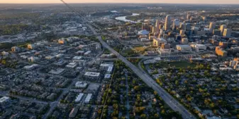 Aerial view of Kansas-Missouri border through Kansas City showing interstate highway and urban development