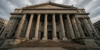 Federal courthouse building with classical columns photographed from low angle