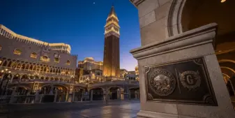 Venetian Las Vegas resort at night under regulatory scrutiny from Nevada gaming authorities