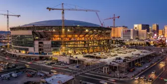 Las Vegas baseball stadium construction beside an unfinished elevated plaza