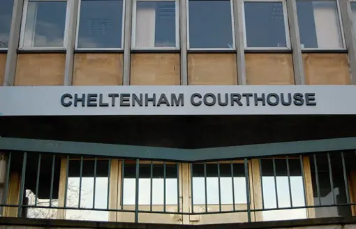 Exterior view of the Cheltenham Courthouse building showing the sign above the entrance.