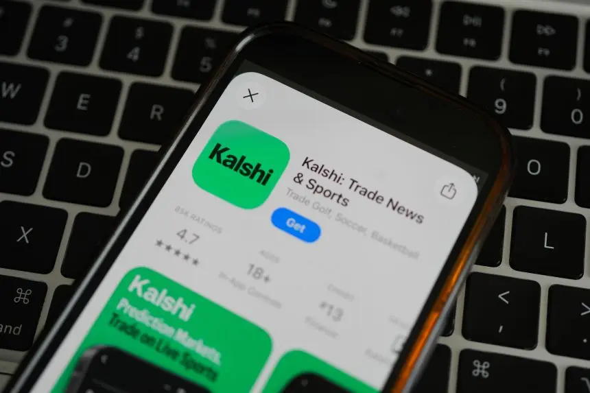 A smartphone displaying the Kalshi prediction market app page on the Apple App Store