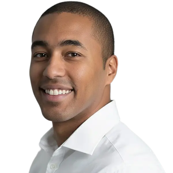 Headshot of Robeson Reeves, CEO of Ballys, wearing a white collared shirt against a black background