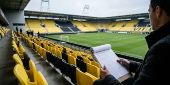 Empty Dutch football stadium representing research into sports betting among young adults