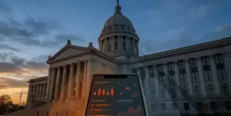 Oklahoma State Capitol behind a smartphone symbolizing prediction-market regulation and tribal gaming authority